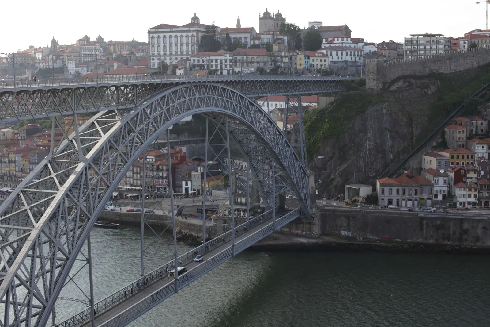 Stunning view of Dom Luís I Bridge spanning the Douro River in Porto, Portugal.
