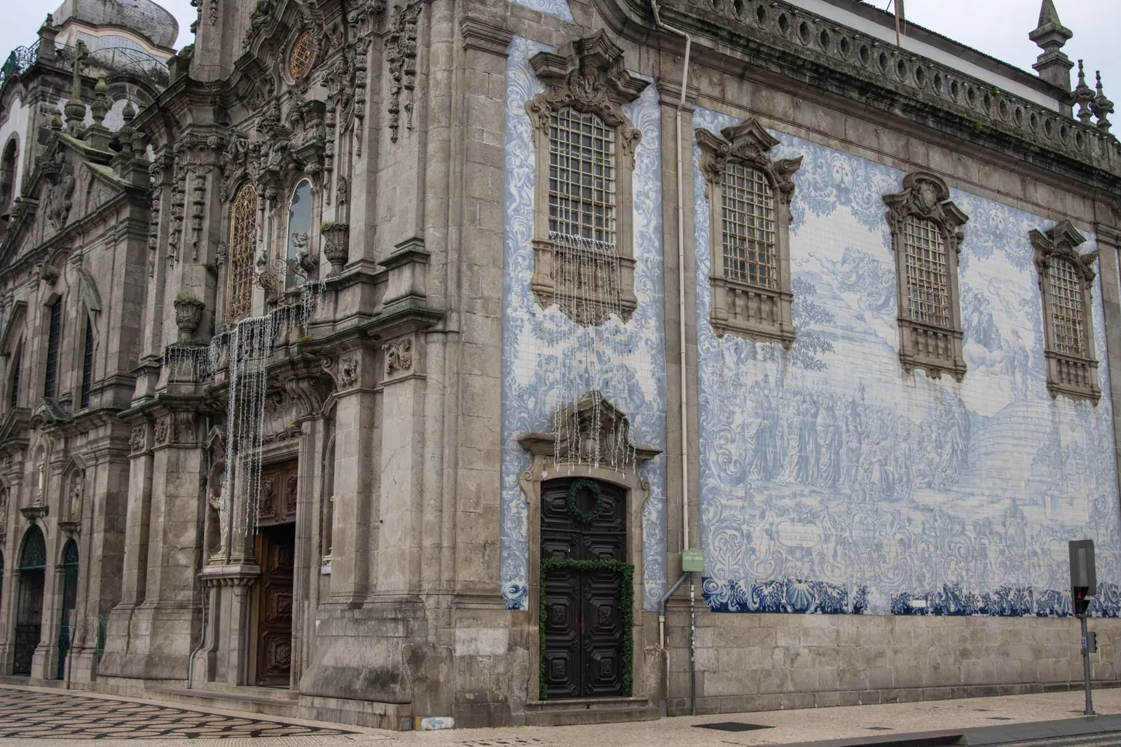 Beautiful church facade with azulejo tiles in Porto, showcasing Portuguese architecture.