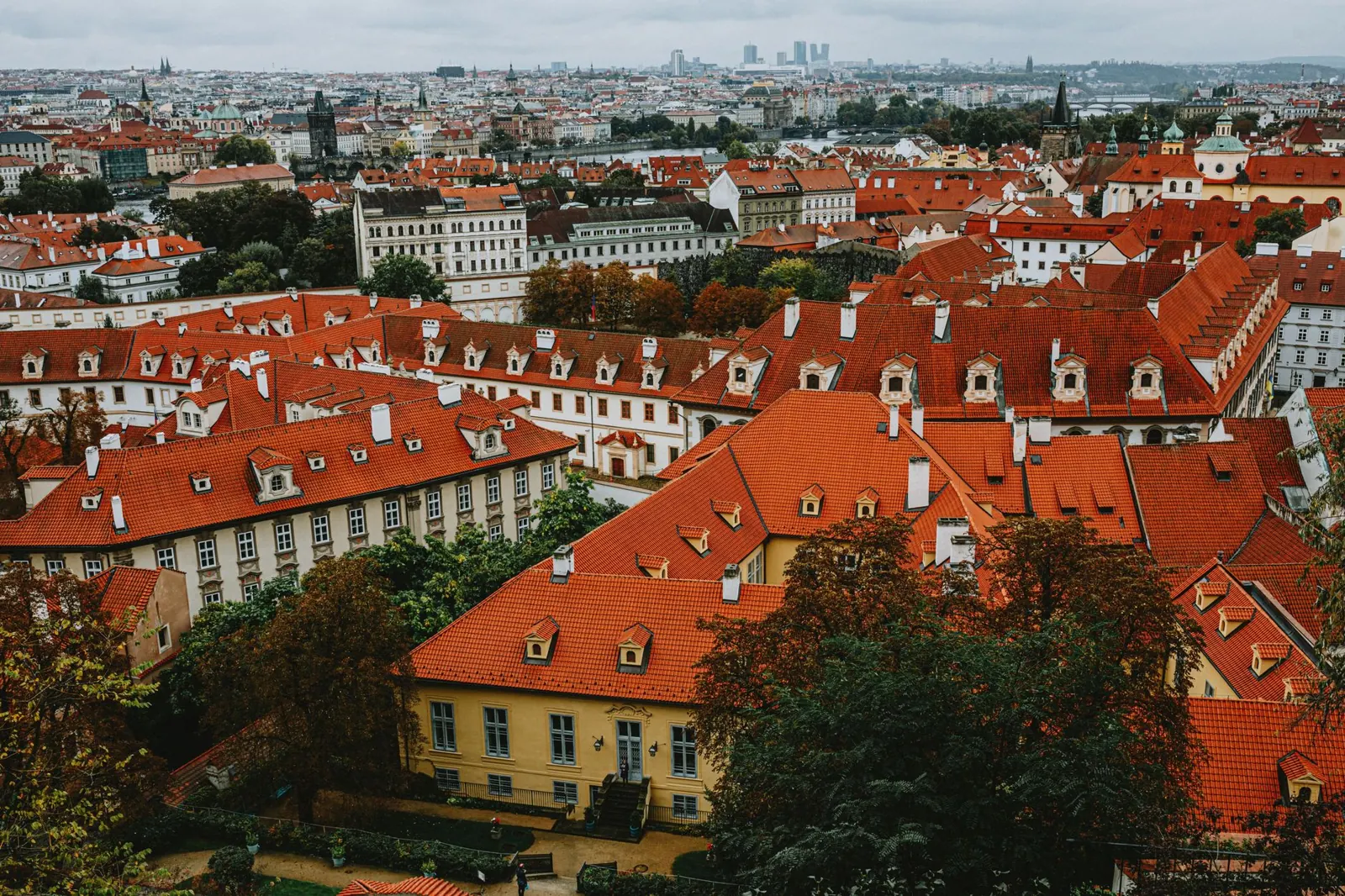 Explore the iconic red rooftops of Prague's historic district from above.