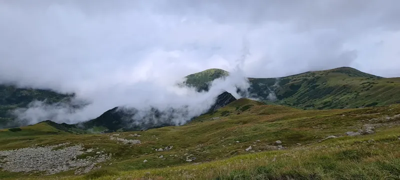 Clouds rolling over a Carpathian ridge