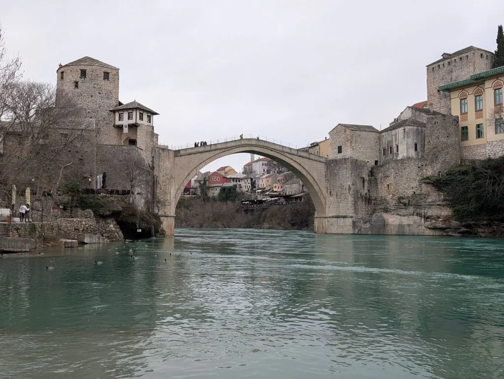 The iconic Stari Most bridge arches over the Neretva River in Mostar, Bosnia and Herzegovina.