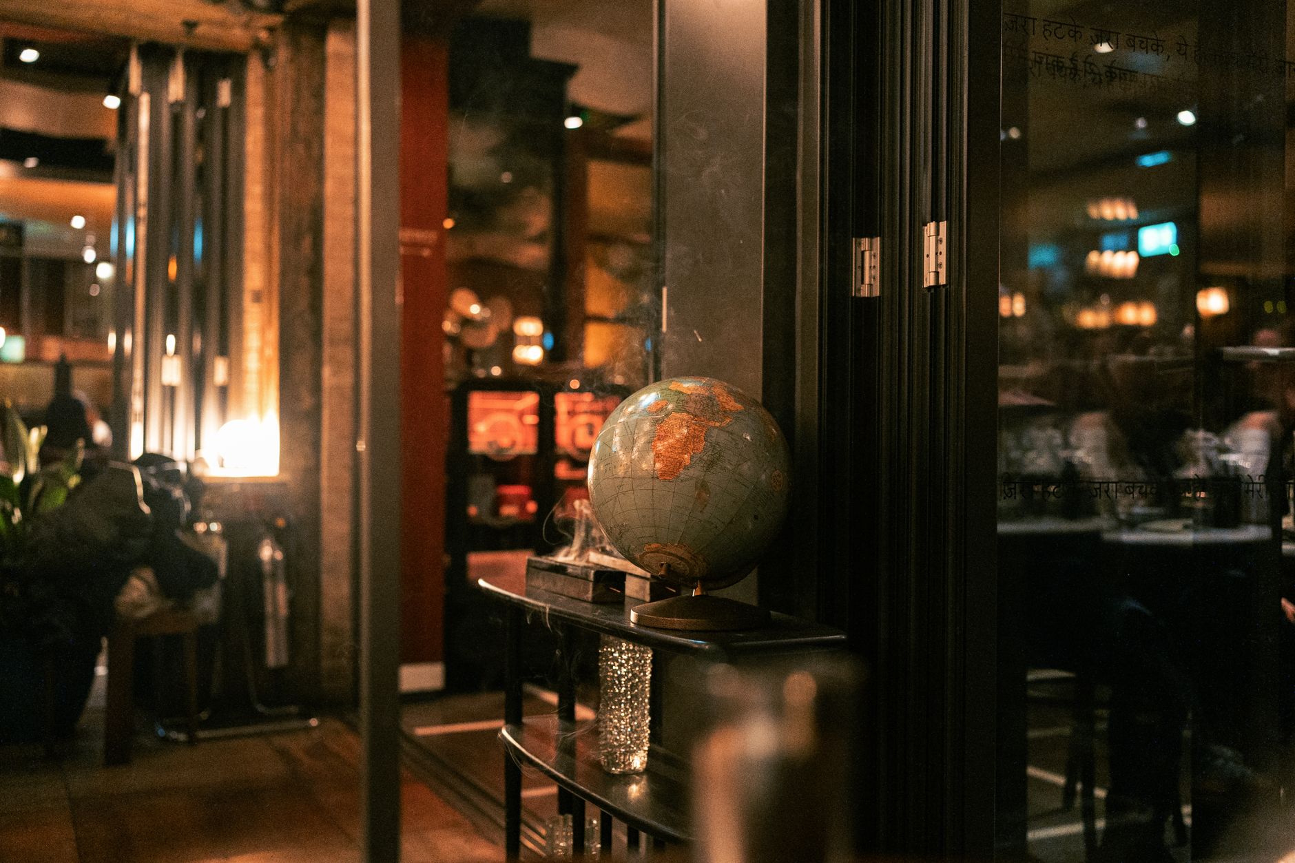 Warm cafe interior in London with soft evening lighting
