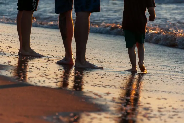 Family enjoying a beach holiday together