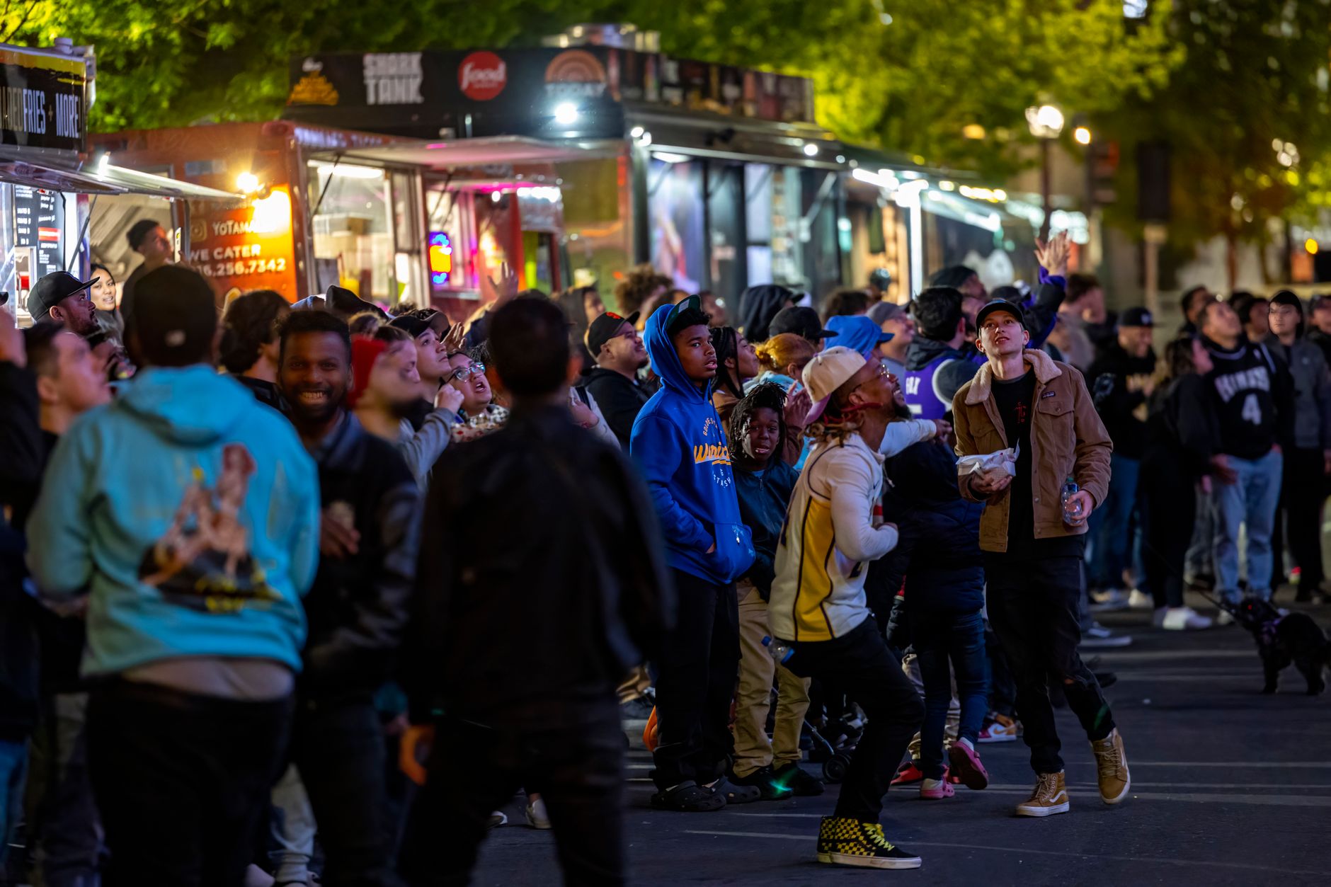 Food truck serving customers on a city street