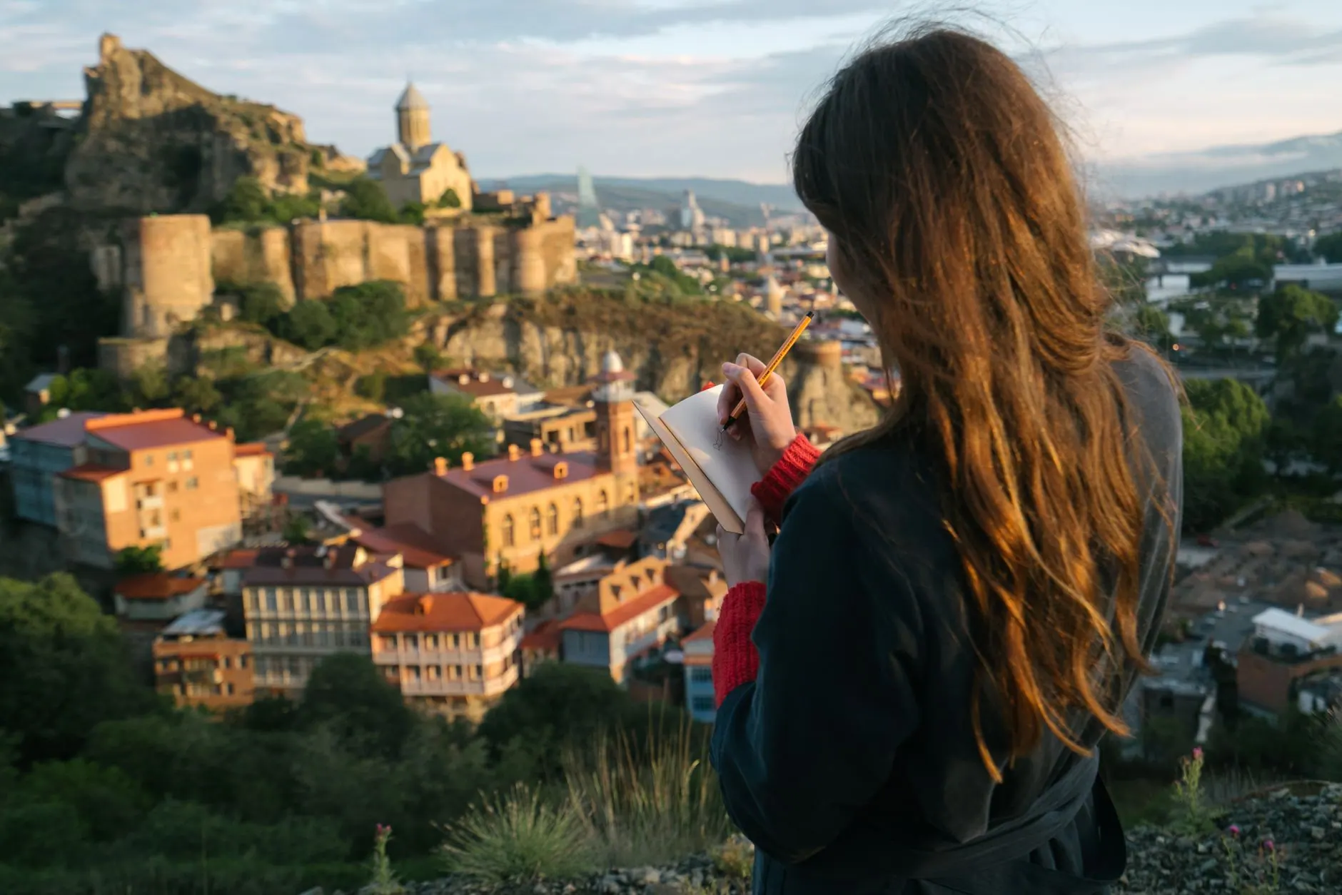 Writing in a travel journal