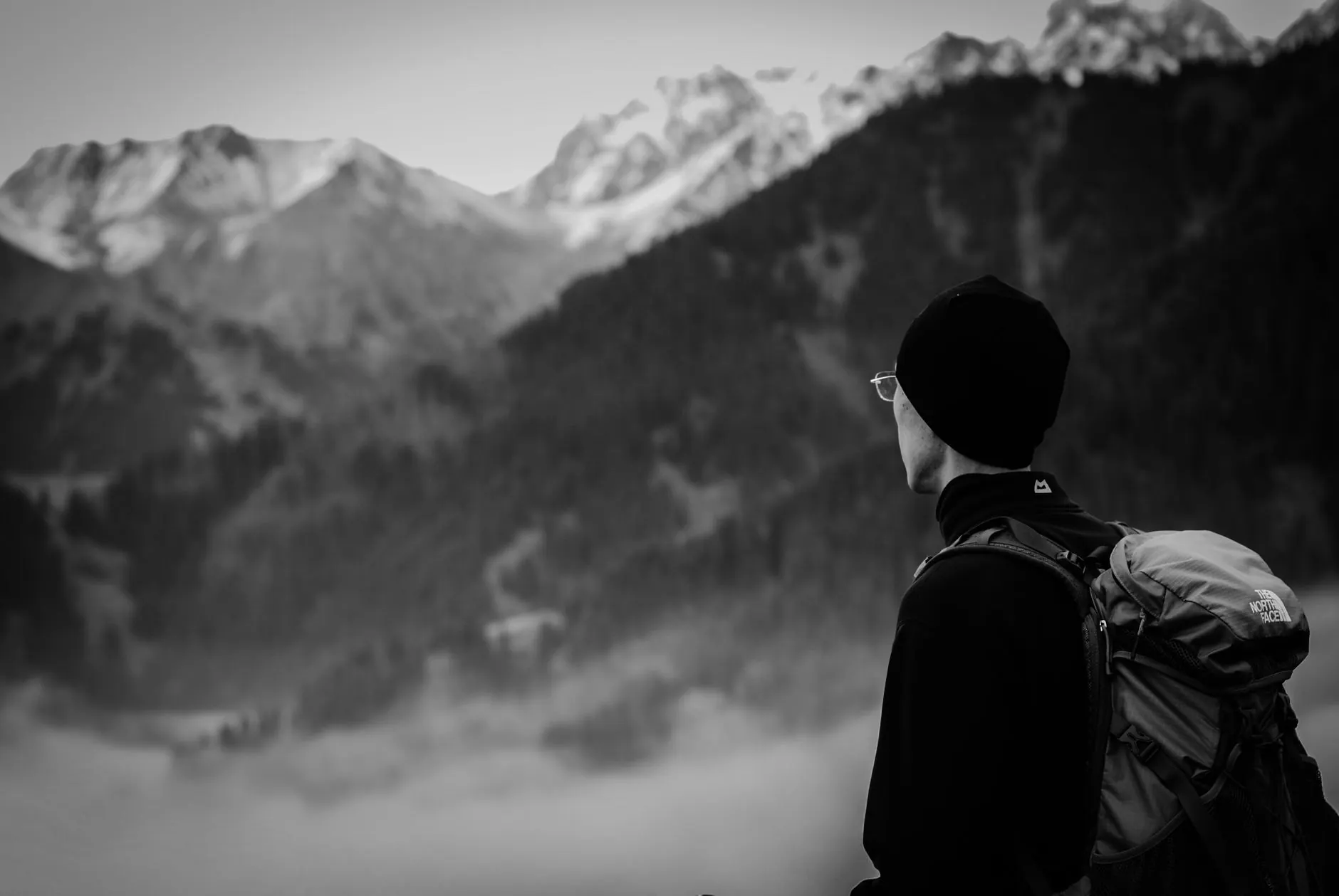 Traveller looking out over the mountains