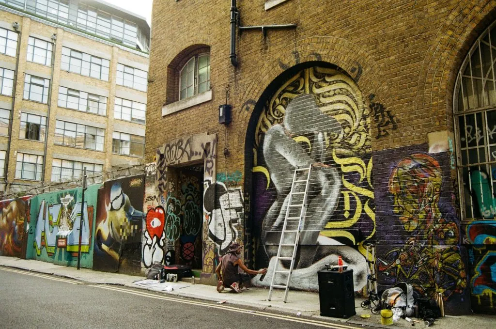 Vibrant street art on Brick Lane, London captures urban creativity and culture.