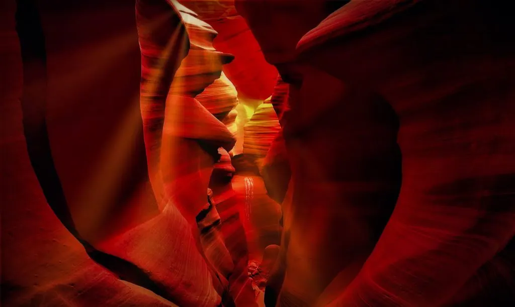 Beautiful red rock formations in Antelope Canyon, Arizona, captured with dramatic lighting.