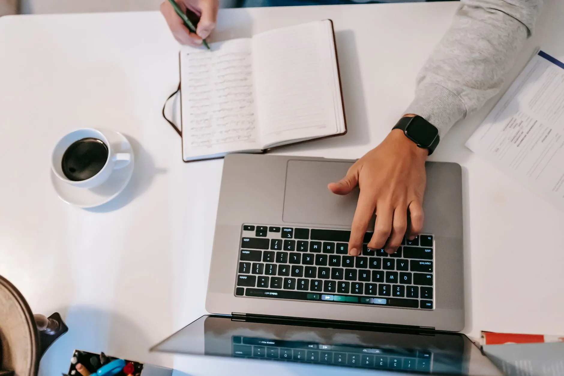 Writing a travel blog on a laptop