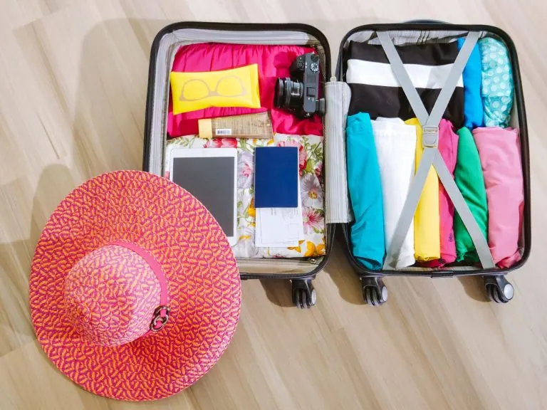 Suitcase packed for a summer holiday